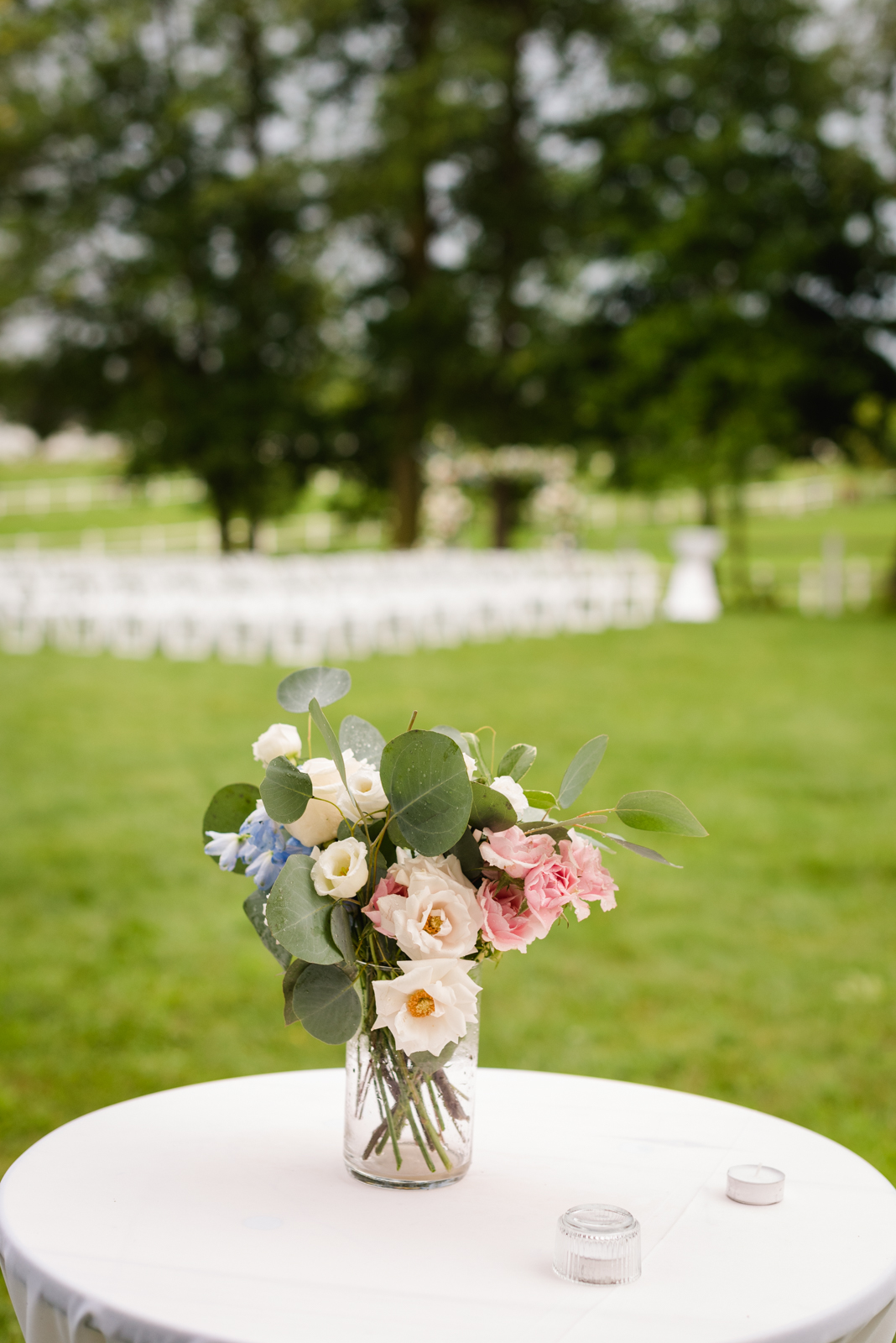 vase of flowers at wedding ceremony