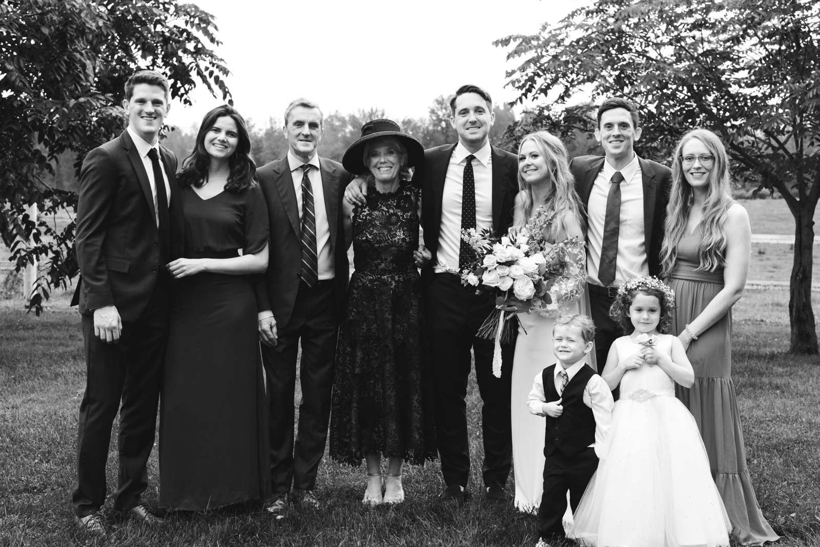 family portrait in black and white at family farm wedding
