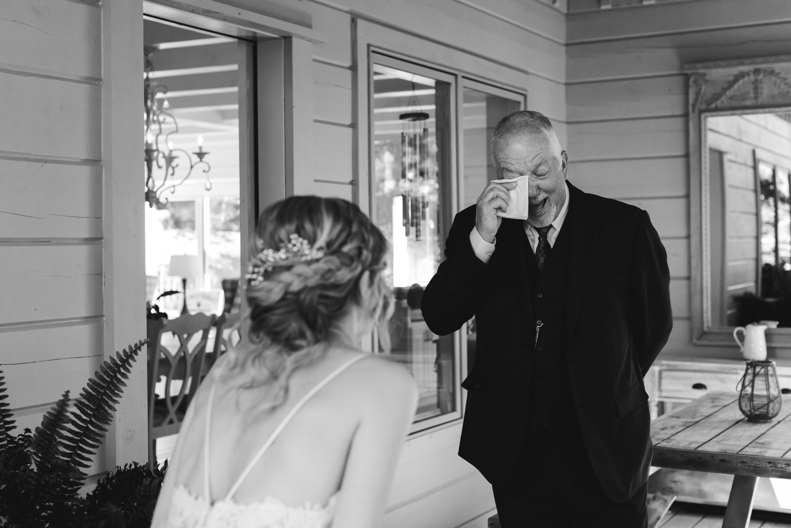 father of the bride seeing bride for the first time in wedding dress