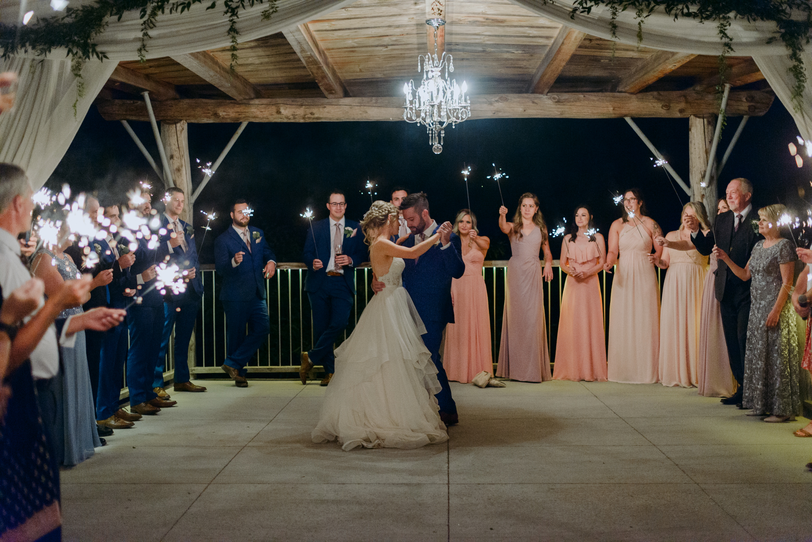 first dance with sparklers at le belvedere wedding outside