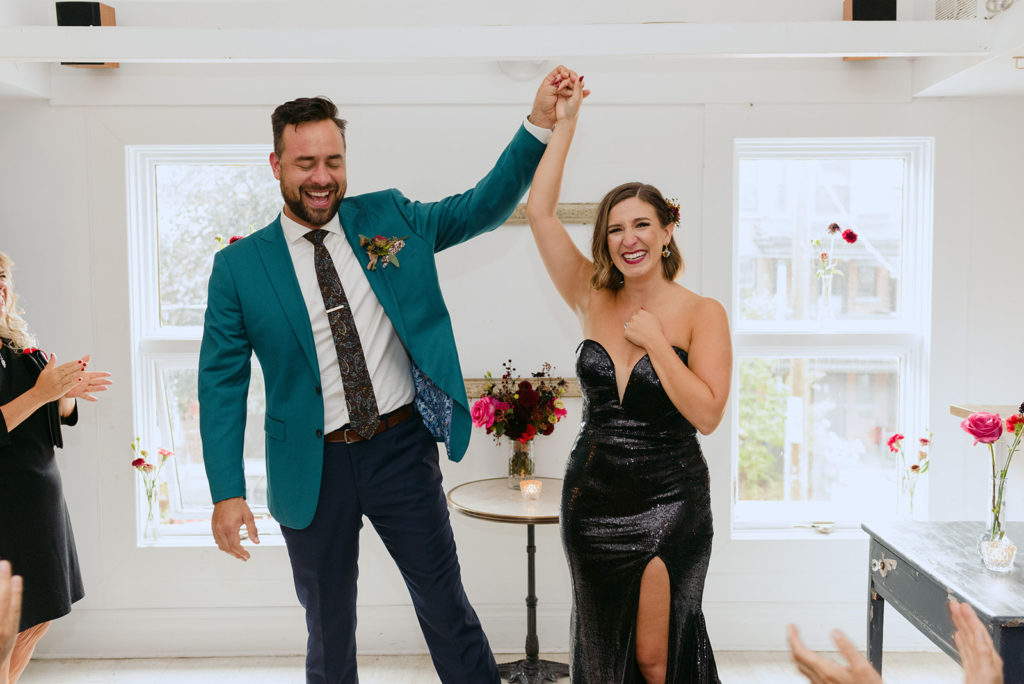 bride and groom pronounced husband and wife at North and Navy wedding in Ottawa