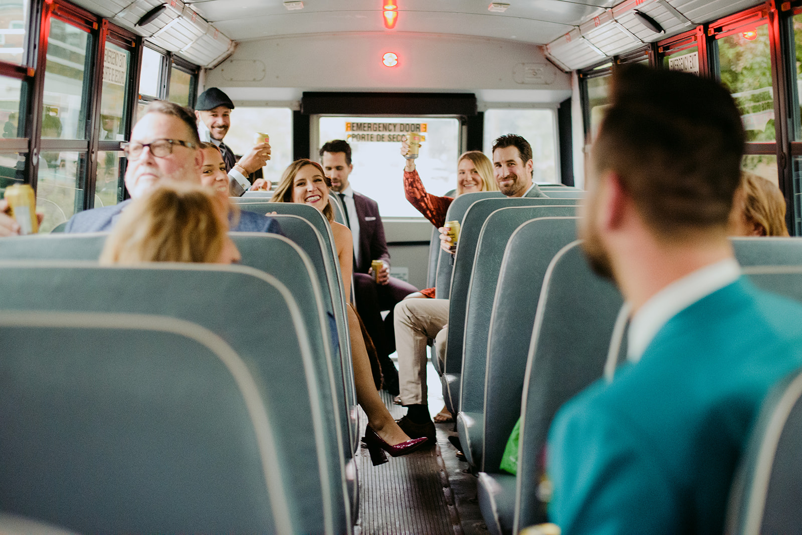 wedding guests on school bus