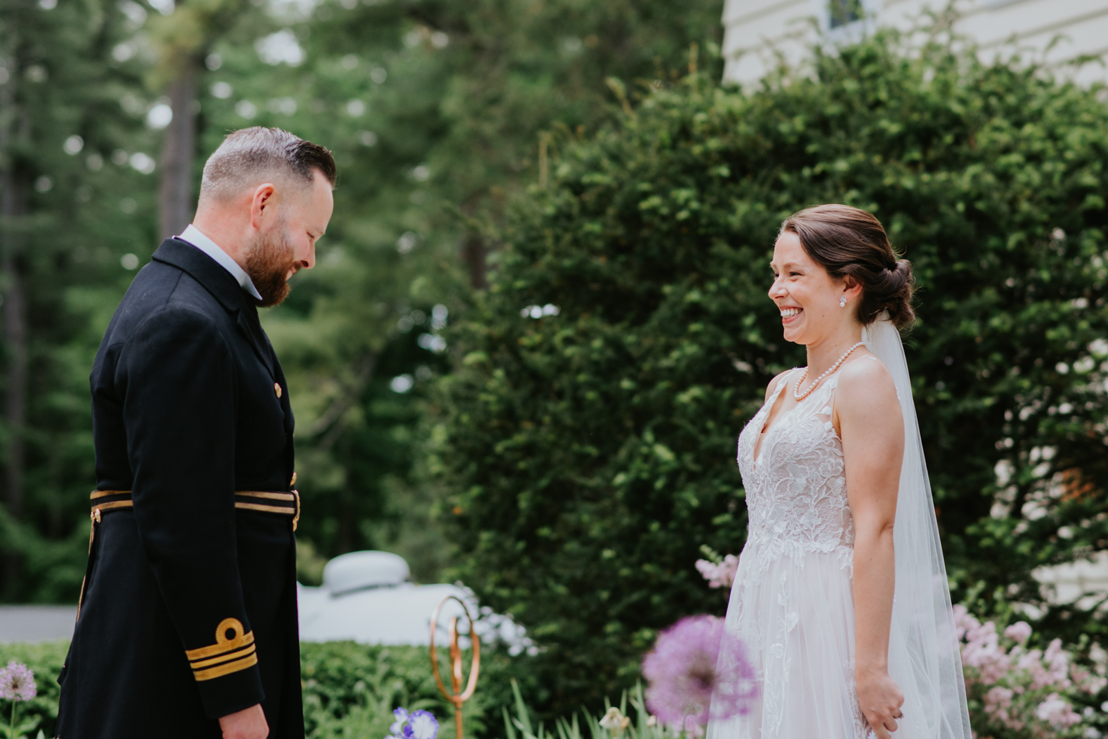 bride and groom in canadian navy uniform with sword first look