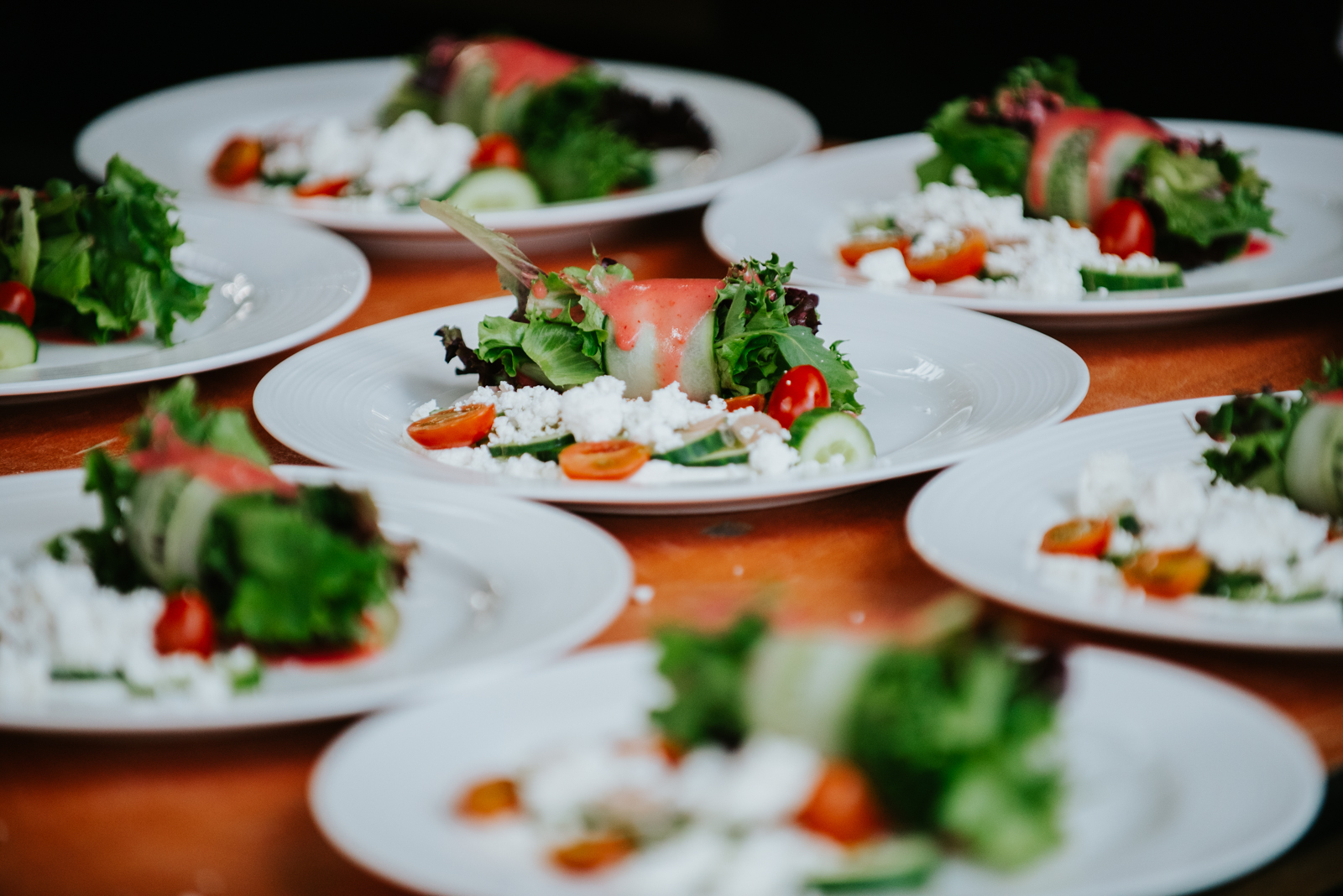 plated salads at wedding reception